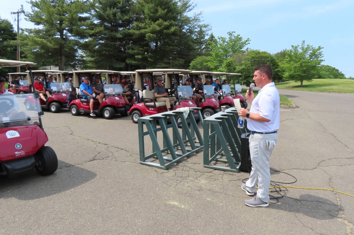 Billy Street, golf pro at Whitney Farms Golf Course, explains tournament rules and payoff holes.