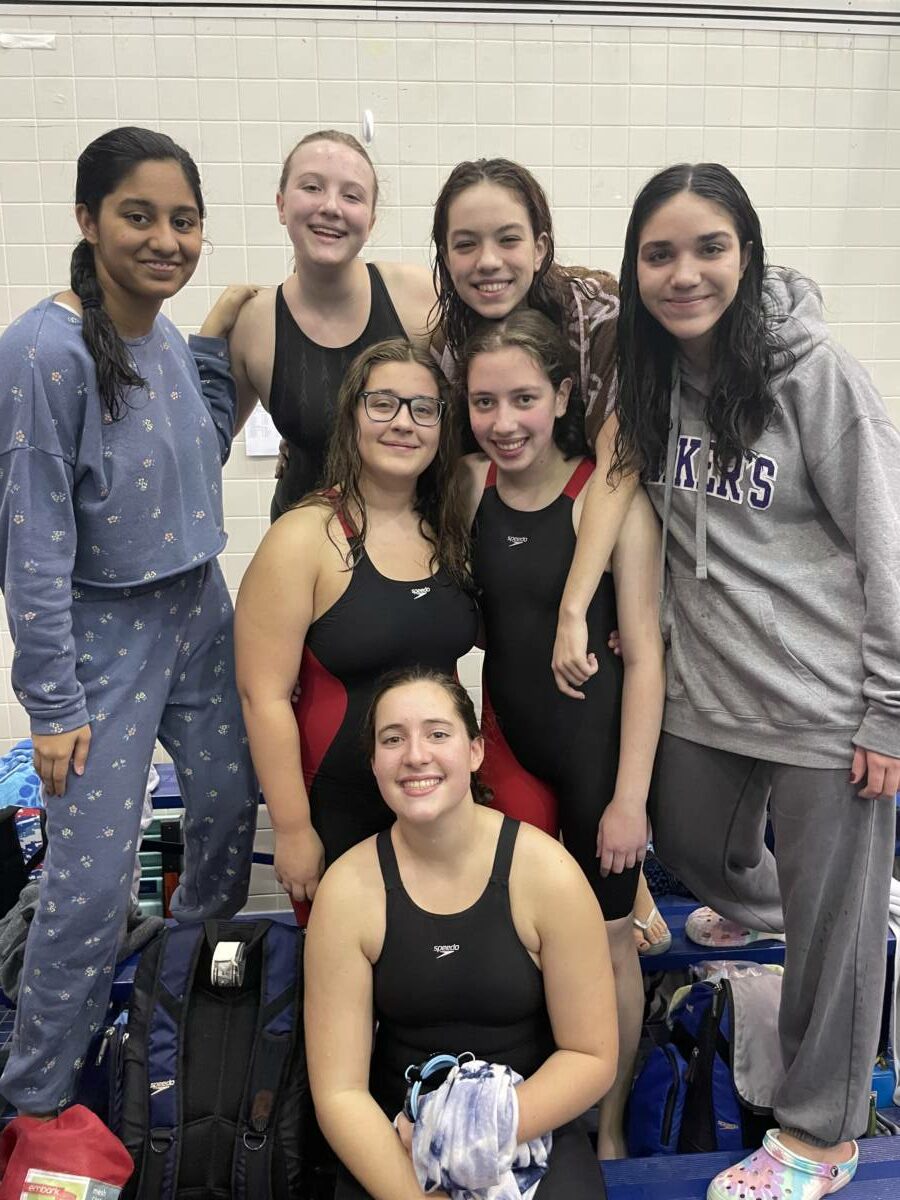 Masuk swimmers at the Class M State Championships: Yara Shaik, Tierney McGunnigle, Juliette Eaton, Lucia Morales, Emily Hull, Abigail Kirberger and Skye Eannotti. Not pictured: Eva Helmke.