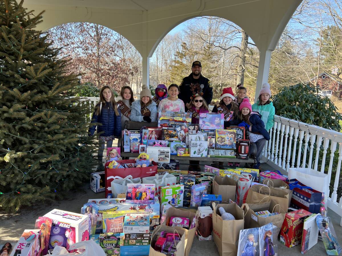 Brownie Troop 34018 makes a big toy donation.