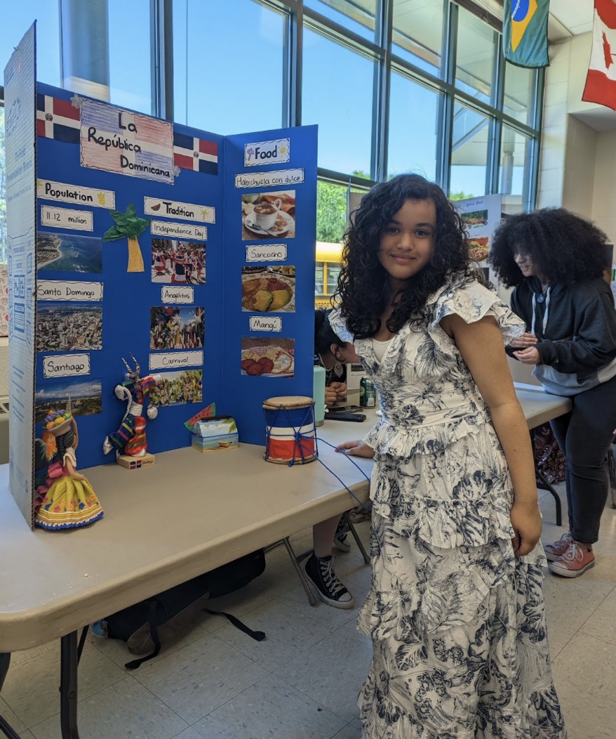 Zoe Estevez, a freshman, worked on her booth with her mother, who also visited the fair.