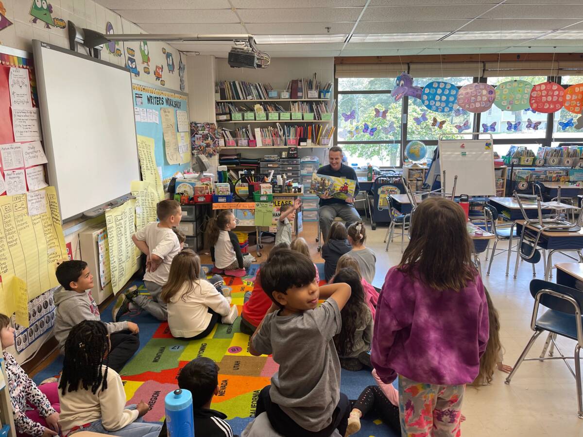 FH Shawn Cornut reading to 2nd grade class